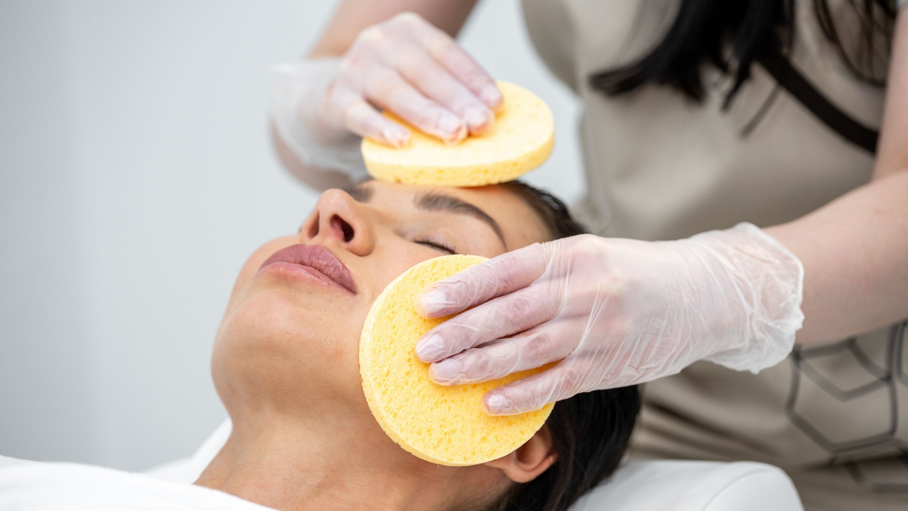 Facial cleansing treatment performed at Evolution Aesthetics Clinic
